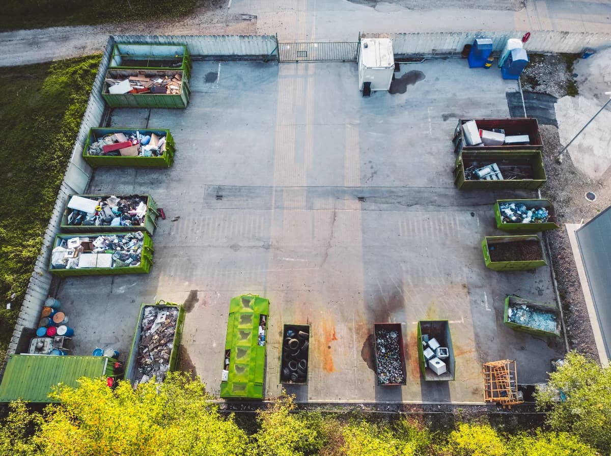 yard of scrap bins
